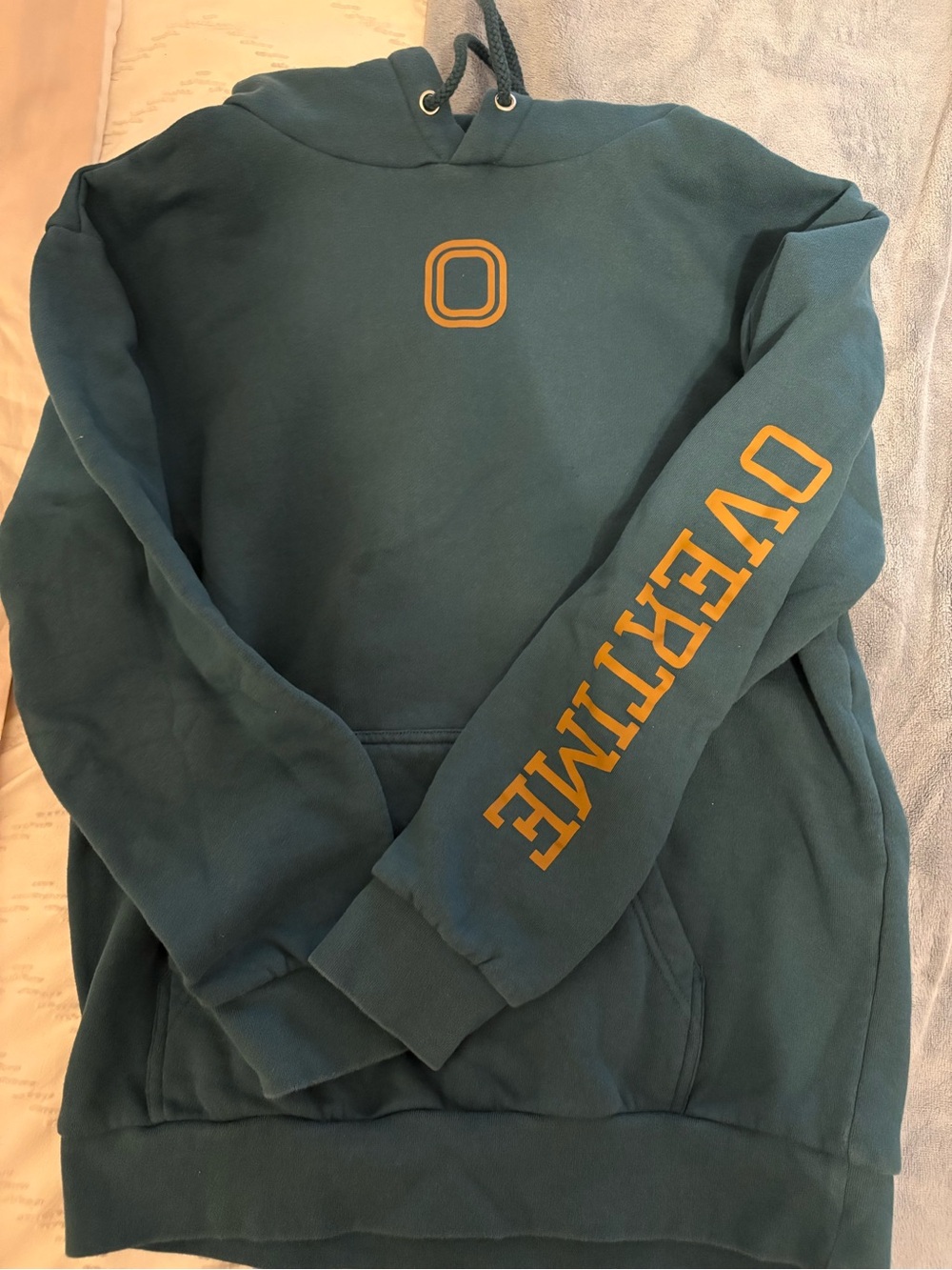 Overtime Teal Hoodie with Gold Accent Logo